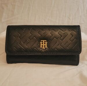 Tommy Hilfiger Distinct Trifold Wallet in black.